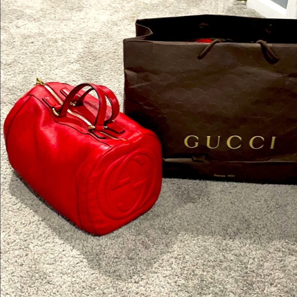 - Red Gucci handbag